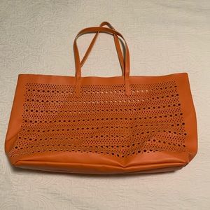 Saks fifth Avenue laser cut tote in tangerine